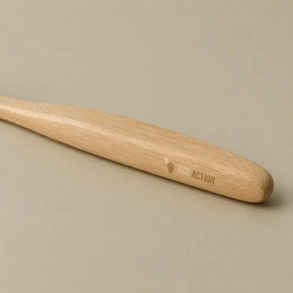 Brosse à dents écologique en bois naturel avec marquage Eco Action.