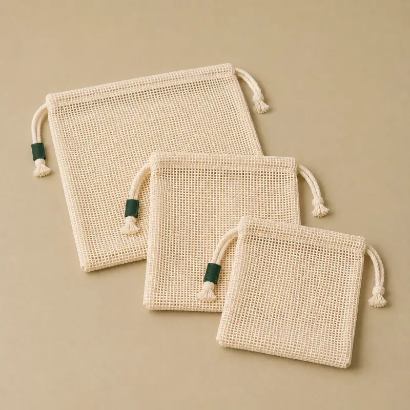 Lot de sacs à vrac réutilisables Eco Action en textile naturel.